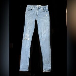 woman’s Levi’s  Blue Distressed Jeans